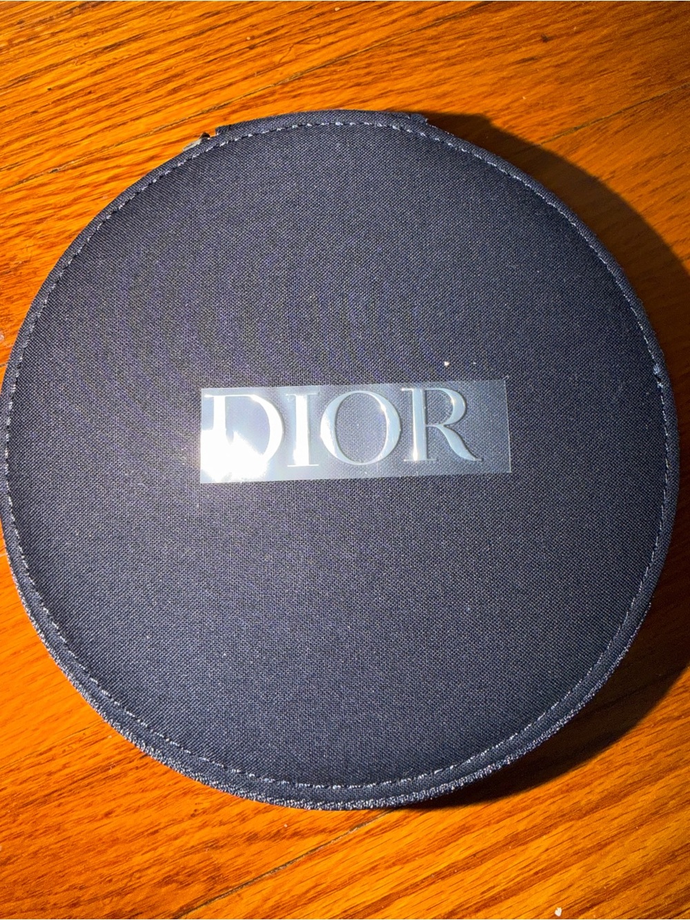 Dior Round Black Cosmetic Case with Silver Logo